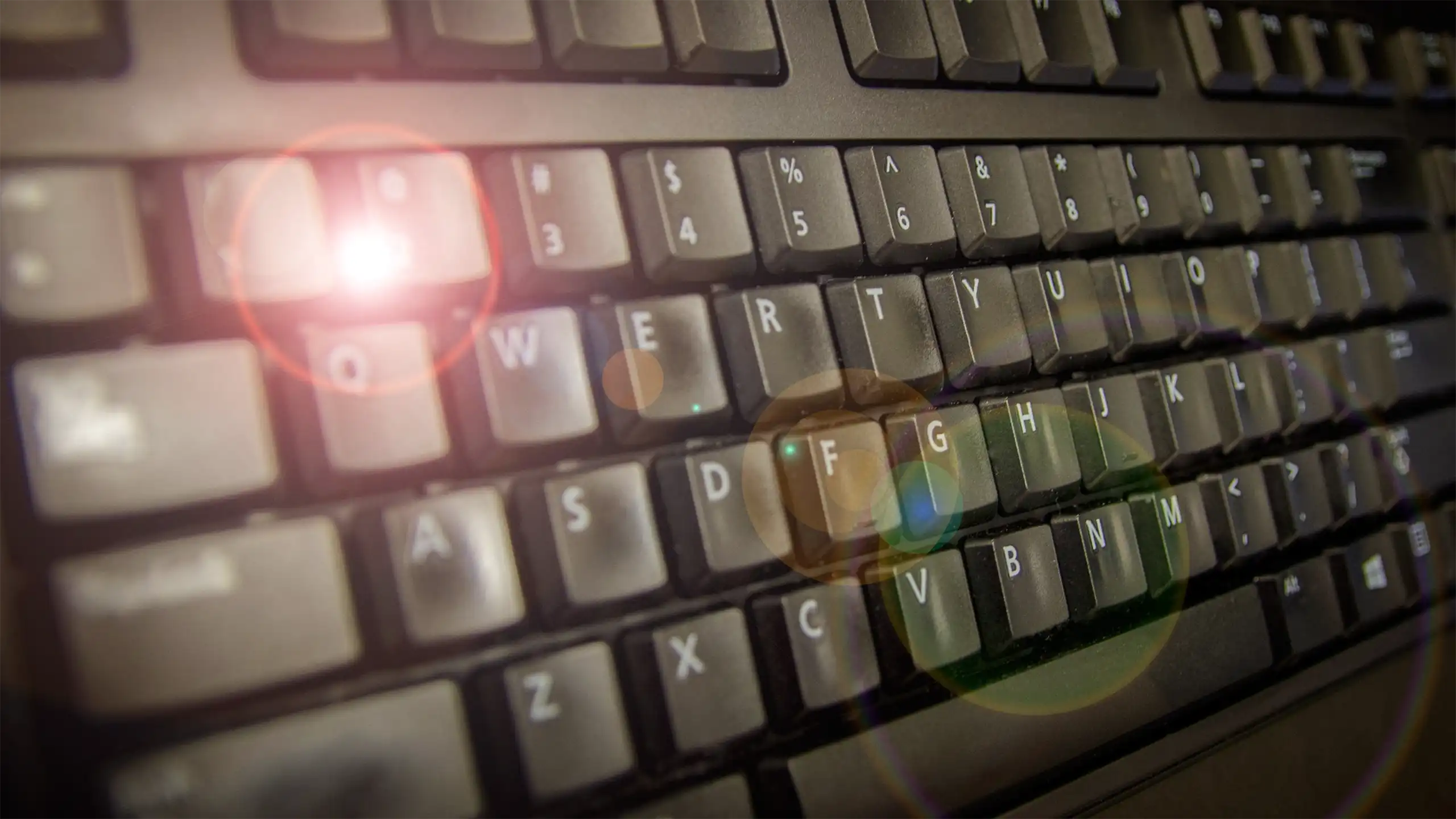 A computer keyboard that represents IT Resources at NC State ISE.