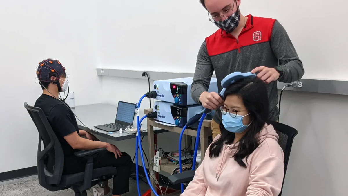 students in the niosh training program test out lab equipment.