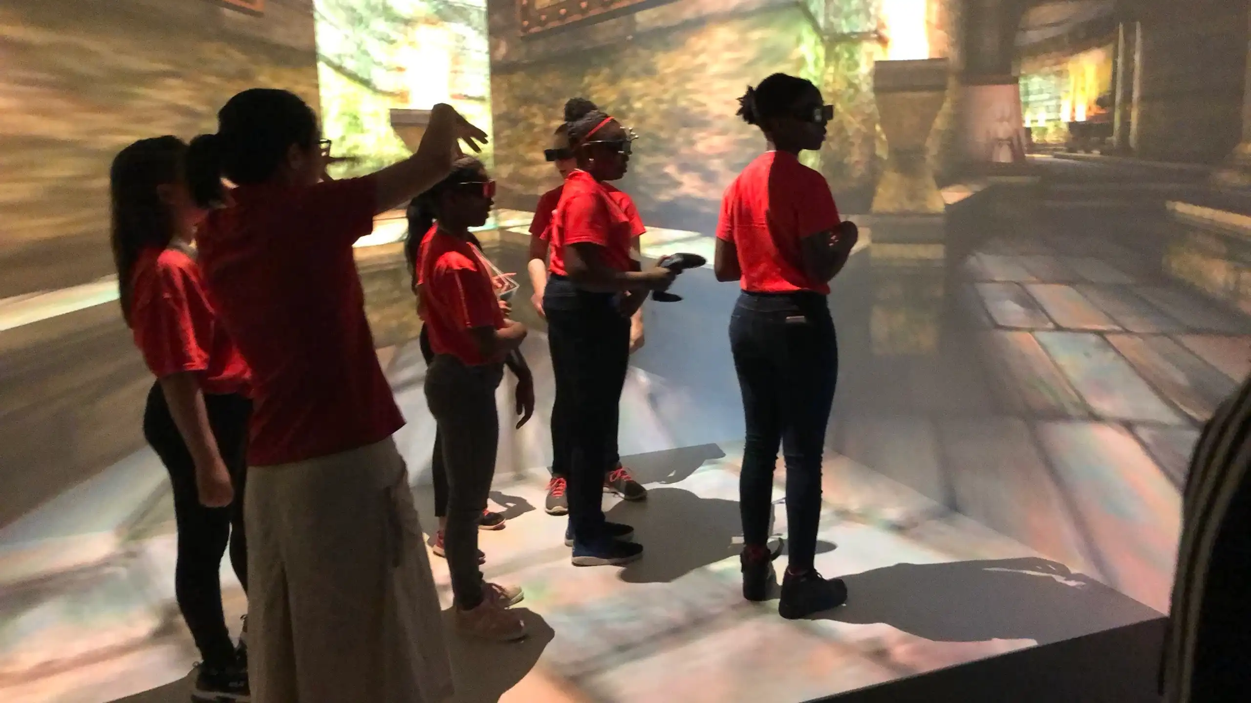 Students from Imhotep Academy experiencing the CAVE.