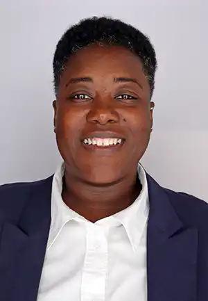 A headshot of Tammy Montgomery standing in front of a white background.