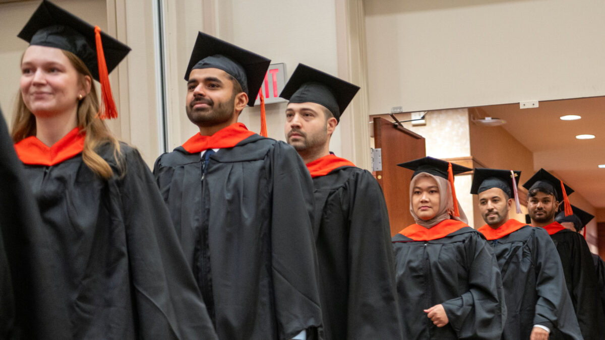 Students walking into the commencement ceremony.