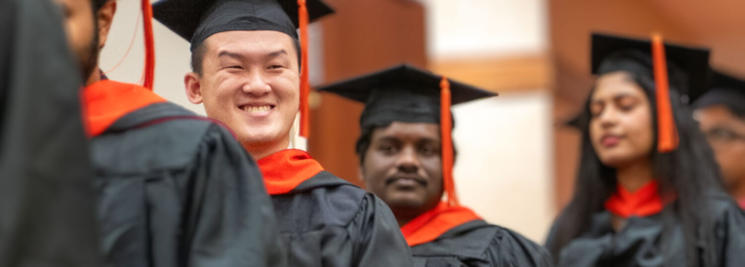 Students walking into the commencement ceremony.