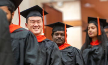 Students walking into the commencement ceremony.