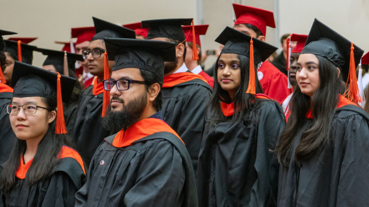 Students walking into the commencement ceremony.