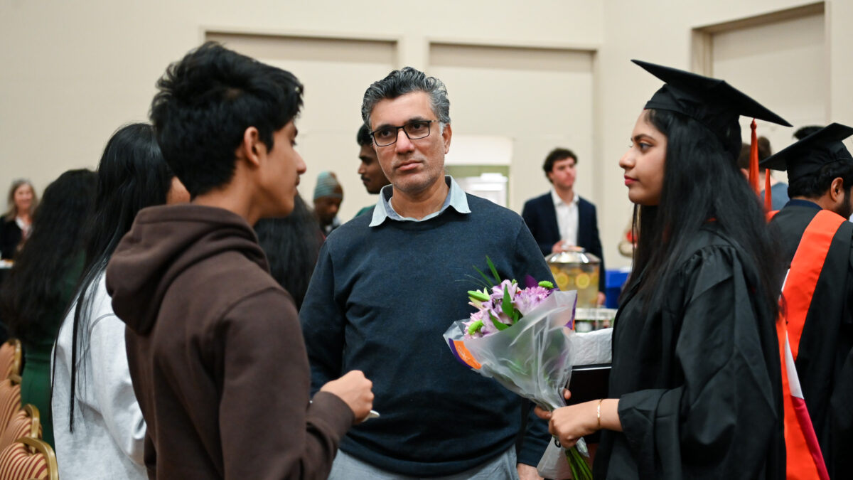 ISE Students celebrating graduation during reception.