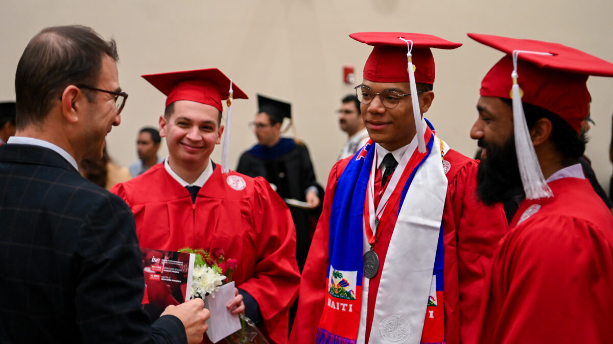 ISE Students celebrating graduation during reception.