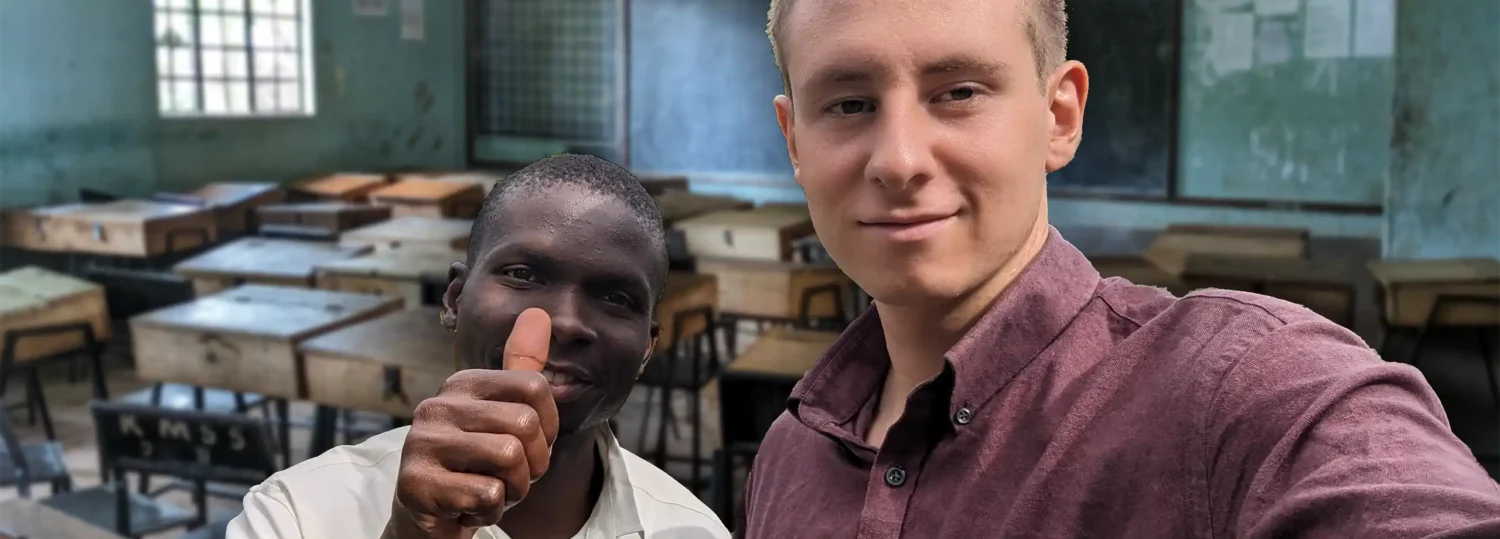 ISE alumnus Lucas Mallison standing with a teacher in the Kenyan school.