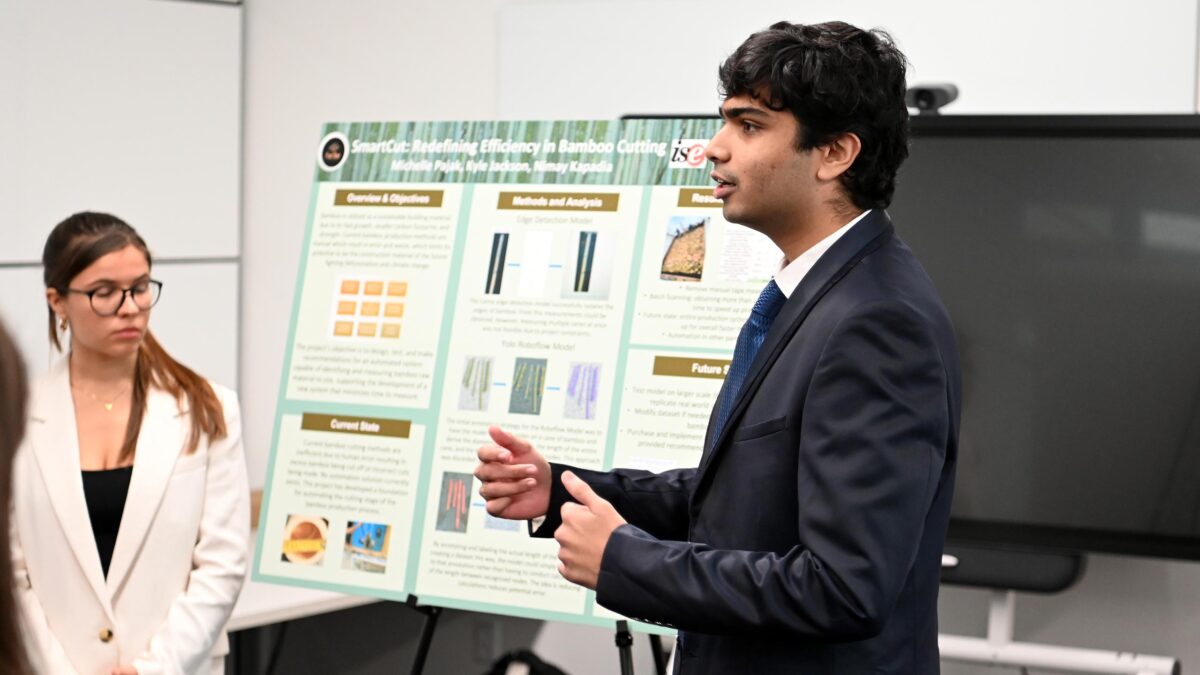 Nimay Kapadia of the winning Team Five Bee presenting his part of the project to the judges.