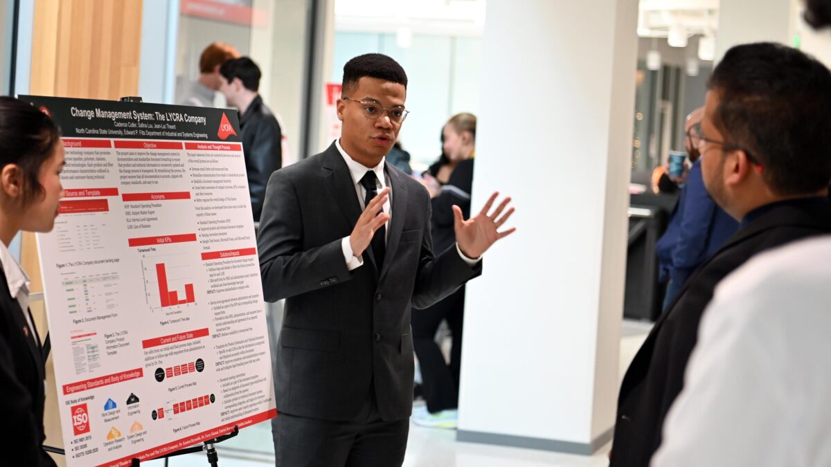 Jean-Luc Theard of Team Lycra presenting his part of the project to the judges.