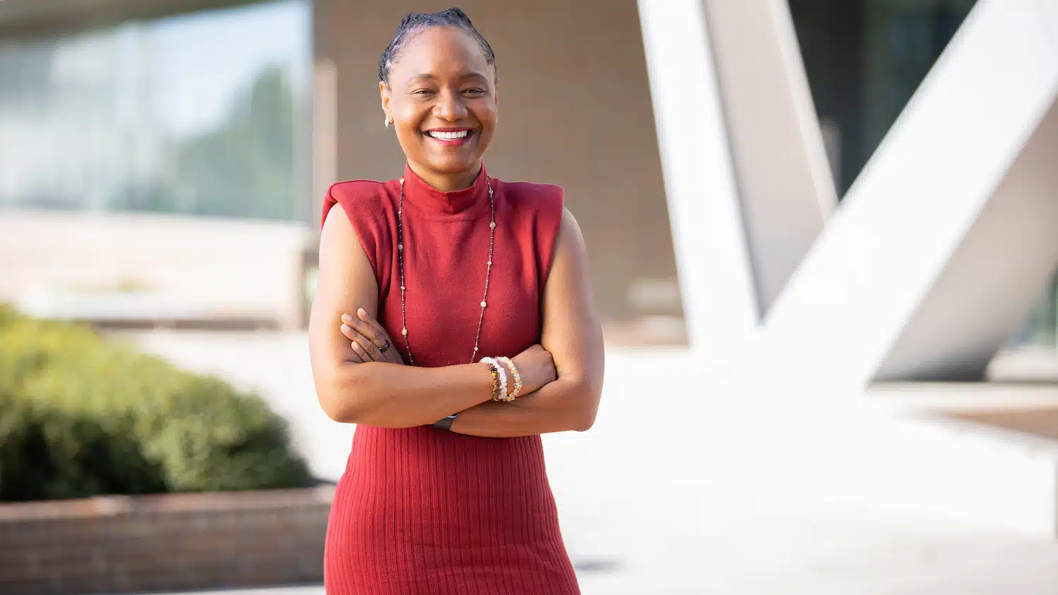 Rashinda Hodge poses outside Fitts Woolard Hall.